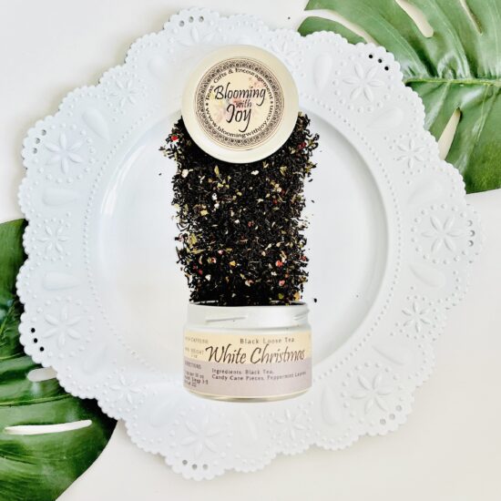 Embrace the magic of the holiday season with our White Christmas Tea. This festive blend features premium black tea infused with candy cane pieces and peppermint leaves, creating a heartwarming taste experience.