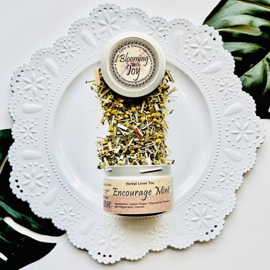 Experience the uplifting blend of peppermint, chamomile, and lemongrass in our Encourage Mint Tea. Caffeine-free and packed with health benefits. Order now and brighten your day!"