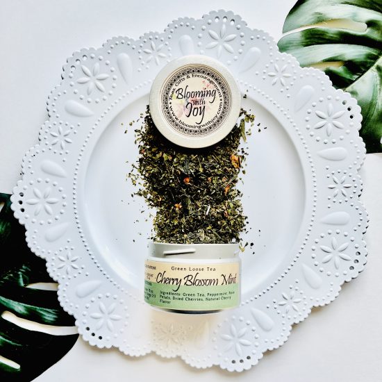 Indulge in the revitalizing blend of Cherry Blossom Mint loose leaf tea. Handcrafted in O’Fallon, MO, this aromatic tea offers a moderate caffeine kick and is perfect for moments of relaxation.